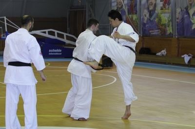 Honbu instructor Akaishi doing Kumite in Dan test